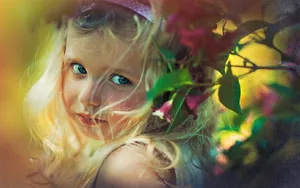 Cute Girl Pose In Green Plant Wallpaper