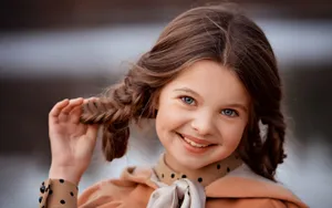Cute Girl With Braided Hair Wallpaper