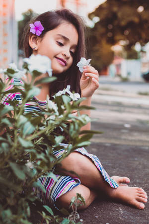 Cute Girl With Purple Flower Wallpaper