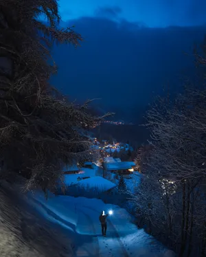 Cute Person Walking During Winter Phone Wallpaper