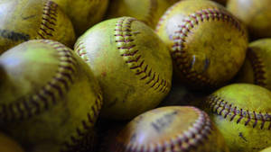 Cute Softballs With Dirt Wallpaper