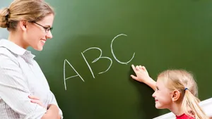 Cute Teacher With Kid Wallpaper