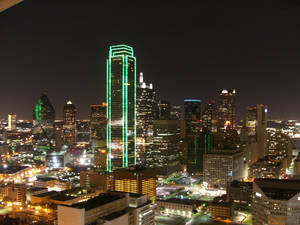 Dallas Skyline Against Black Sky Wallpaper