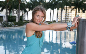 Daniela Hantuchova Enjoying Her Time By The Swimming Pool Wallpaper