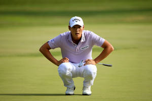 Danny Lee Measuring Distance Of Ball Wallpaper