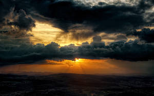 Dark Cloudy Sunset Wallpaper