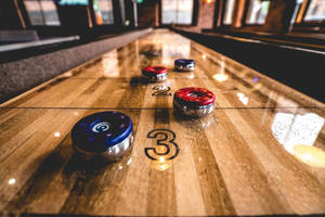 Dark Vintage Shuffleboard Tight Shot Wallpaper