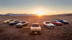 Datsun Vintage Car On The Road Wallpaper