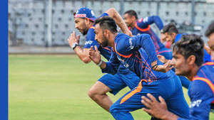 Delhi Capitals Players Running Wallpaper