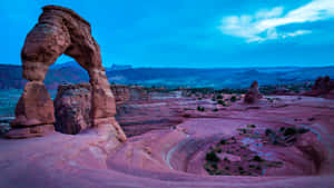 Delicate Arch View Under Blue Sky Wallpaper