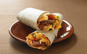 Delicious Wrapped Chicken Burrito Wallpaper