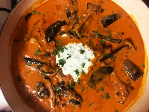 Delicious Yellow Curry Enriched With Minced Herbs And Cream Wallpaper