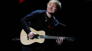 Delighted Ed Sheeran Singing Wallpaper