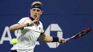 Denis Shapovalov In Action On Court Wallpaper