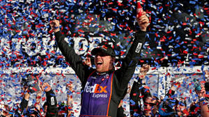 Denny Hamlin Holding Coca Cola Bottle Wallpaper