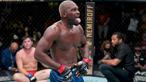 Derek Brunson Tongue Out Shorts Wallpaper