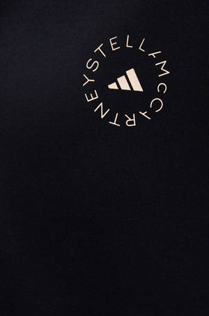 Designer Logo On Adidas Shirt Wallpaper