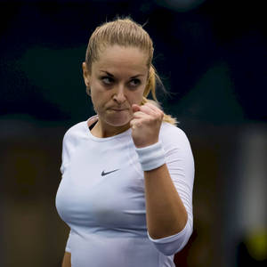 Determined Sabine Lisicki On The Tennis Court Wallpaper