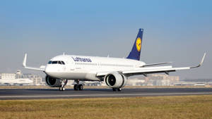 Deutsche Lufthansa Plane On The Runway Wallpaper