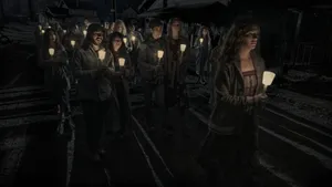 Devotees Attending Midnight Mass With Lit Candles Wallpaper