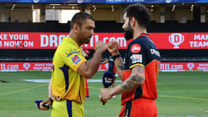 Dhoniand Kohli Fist Bumpat I P L Wallpaper