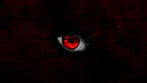 Digital Red Eye: A Symbol Of Intensity And Focus Wallpaper