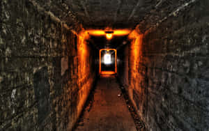 Dimly_ Lit_ Concrete_ Tunnel Wallpaper