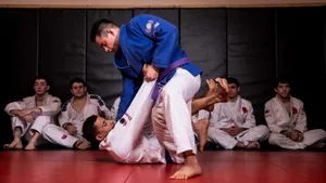 Disciplined And Focused Jiu-jitsu Fighters In Action Wallpaper