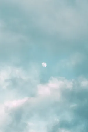 Distant Moon Aesthetic Light Blue Wallpaper