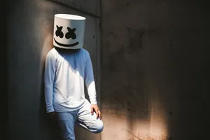 Dj Marshmello Against Wall Wallpaper