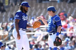 Dodgers Pitcherand Catcher Strategy Discussion Wallpaper
