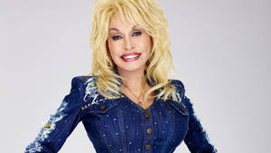 Dolly Parton In Blue Denim Wallpaper