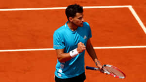 Dominic Thiem Celebratingon Clay Court Wallpaper