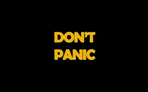 Don’t Panic Yellow Black Background Wallpaper