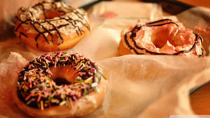 Donuts With Toppings Desserts Wallpaper