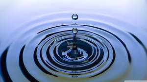 Double Droplets And Rippling Water Wallpaper