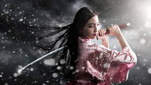 Dramatic Japanese Girl With Sword Wallpaper