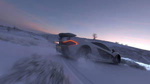 Drifting Racing Car In Snow Wallpaper