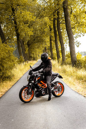 Driving Down Forest Road Ktm Iphone Wallpaper