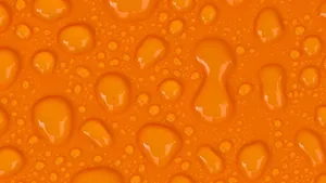 Droplets On An Orange Background Wallpaper