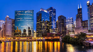 Dusk Chicago Skyline Along The River Wallpaper