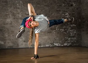 Dynamic Hip Hop Dancer Freeze Move Wallpaper