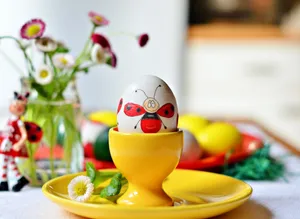 Easter Egg On Yellow Egg Holder Wallpaper