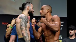 Edson Barboza And Shane Burgos Face-off Wallpaper