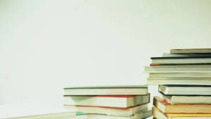 Education Two Stacks Of Books Wallpaper