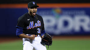 Edwin Diaz Celebrating In Black Mets Jersey Wallpaper