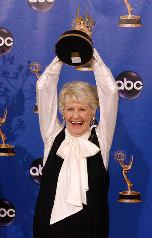 Elaine Stritch Triumphantly Raising Her Emmy Awards Wallpaper