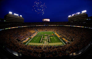 Electric Atmosphere At The University Of Tennessee Game Night Wallpaper