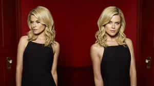 Elegant Blonde Twin Portraits Wallpaper