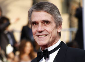 Elegant Jeremy Irons In A Black Suit Wallpaper